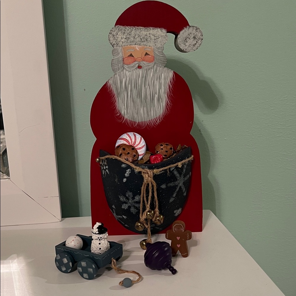 Hand painted wooden Santa Claus with toys